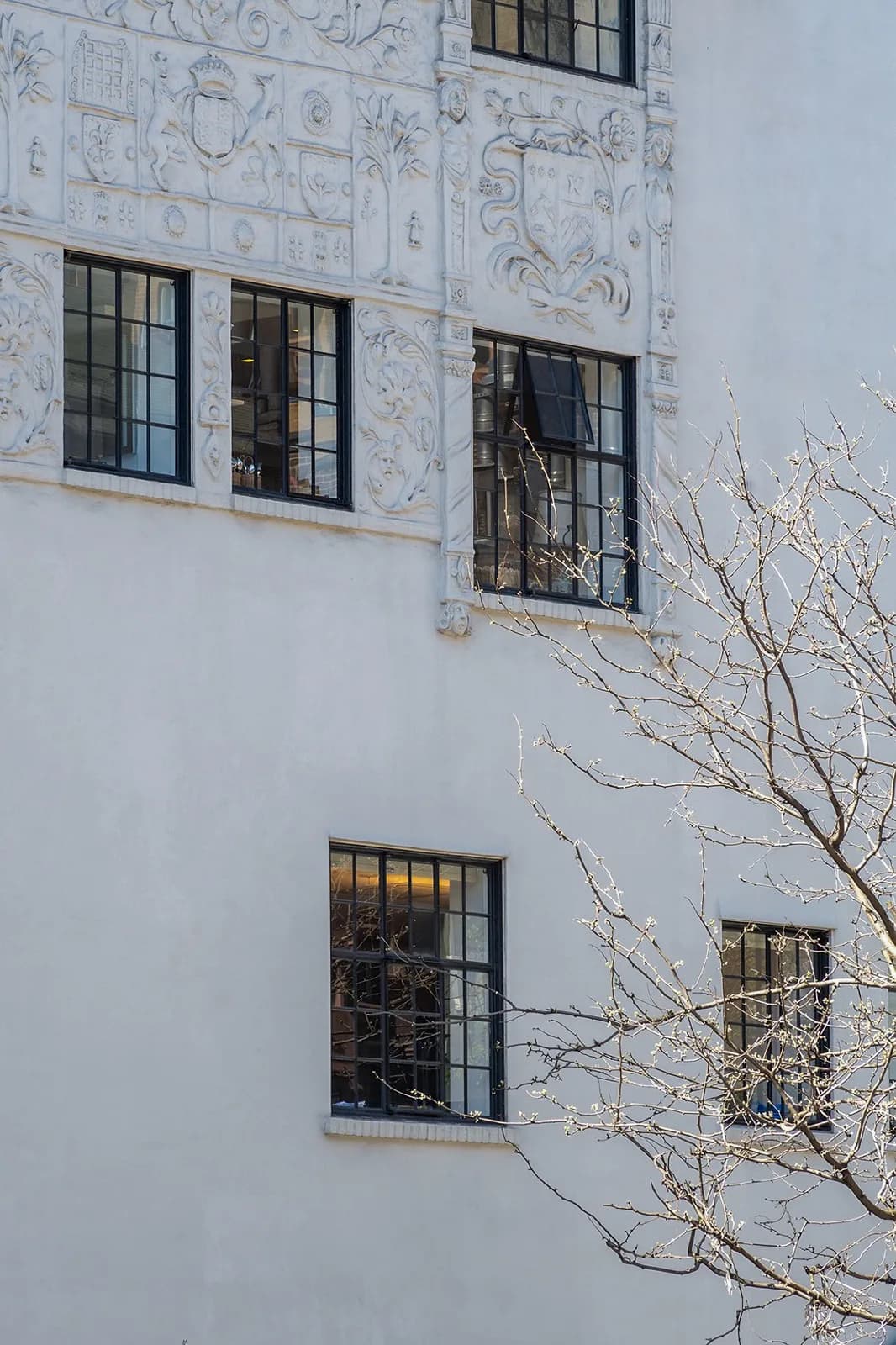 Completed exterior restoration detail at 866 Lexington Avenue
